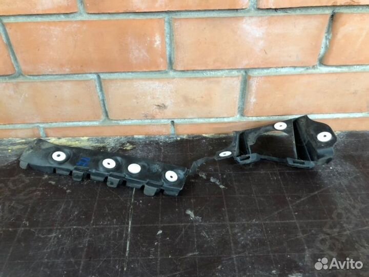 Кронштейн бампера задний левый Opel Astra J