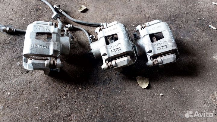 Суппорт тормозной передний. Lacetti. Daewoo Gentra