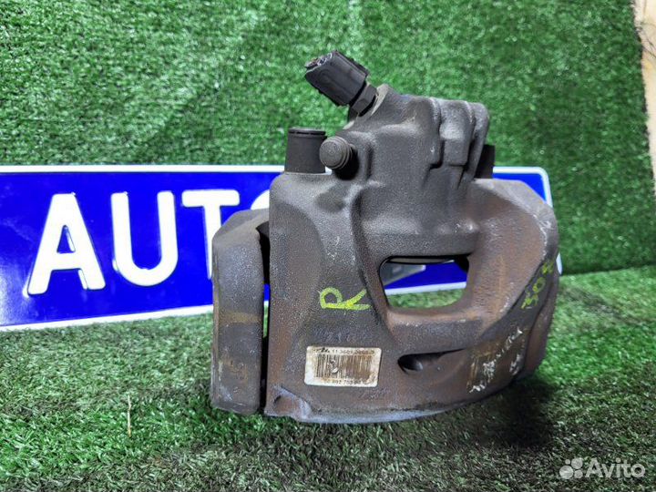 Суппорт тормозной передний правый Peugeot 308 Sw