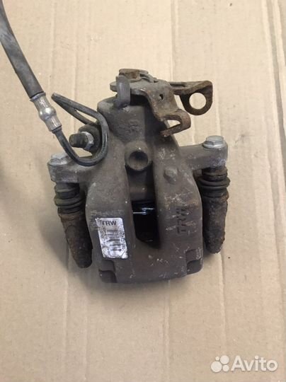 Суппорт задний левый Peugeot 308