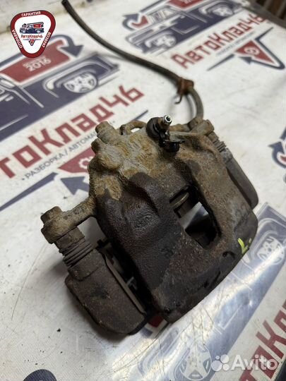 Суппорт тормозной передний левый Hyundai / Kia