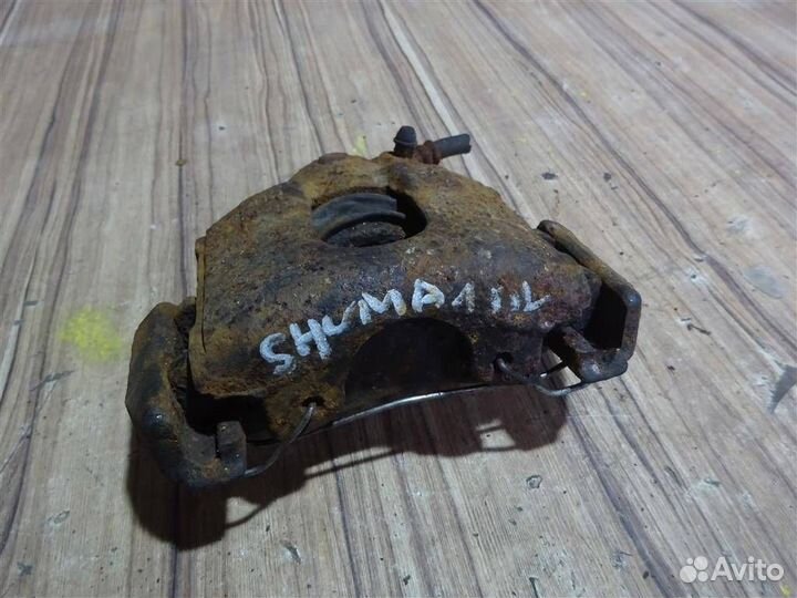 Суппорт передний левый Kia Shuma 1996-2001