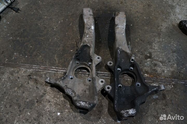 BMW Е70 Х5 Кулак поворотный передний