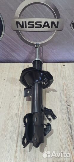 Амортизатор стойка перед Nissan tiida Прав