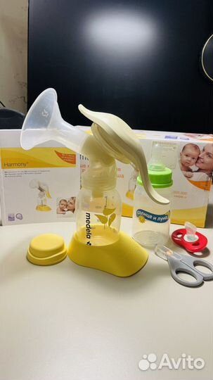 Молокоотсос Медела Medela ручной