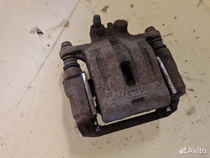 Суппорт задний левый Mazda Cx-7