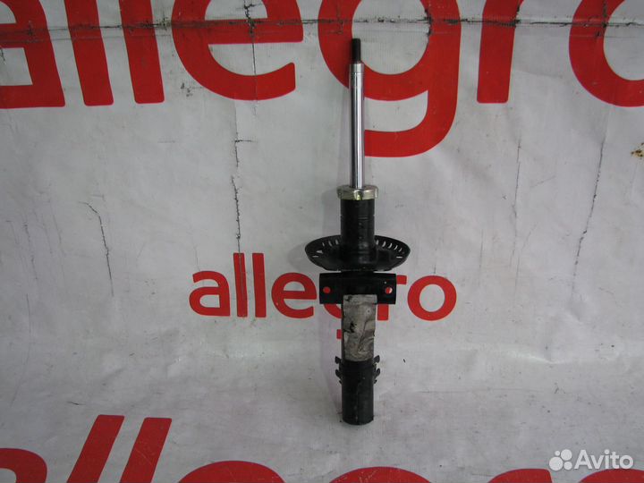 Skoda Rapid Volkswagen Polo Передний амортизатор