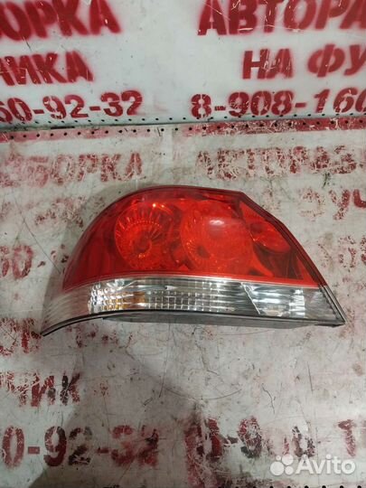 Фонарь задний левый лансер 9