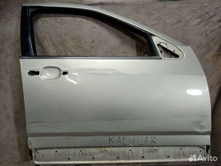 Cadillac srx двери