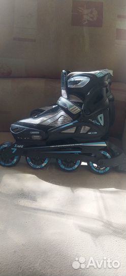 Роликовые коньки