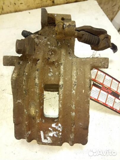 Суппорт задний левый Volkswagen Golf