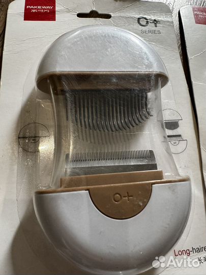 Расческа для вычесывания шерсти кошек и собак