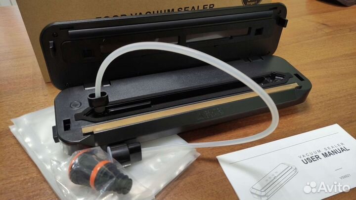 Вакуумный упаковщик новый