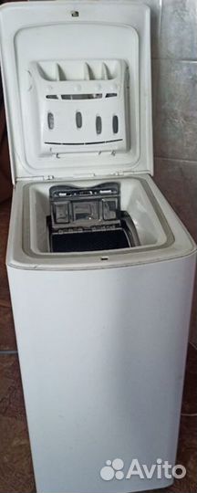 Стиральная машина с вертикальной загрузкой