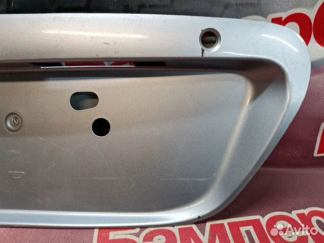 Накладка крышки багажника задняя Mitsubishi Lancer