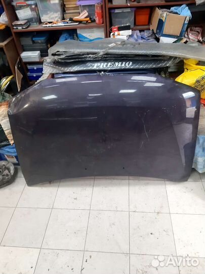 Капот для Мазды Демио