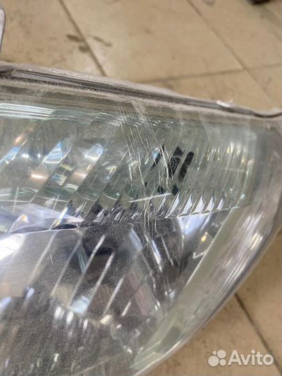 Фара левая Toyota Corolla axio nze141