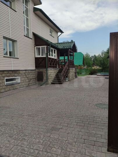 Коттедж 353 м² на участке 10 сот.