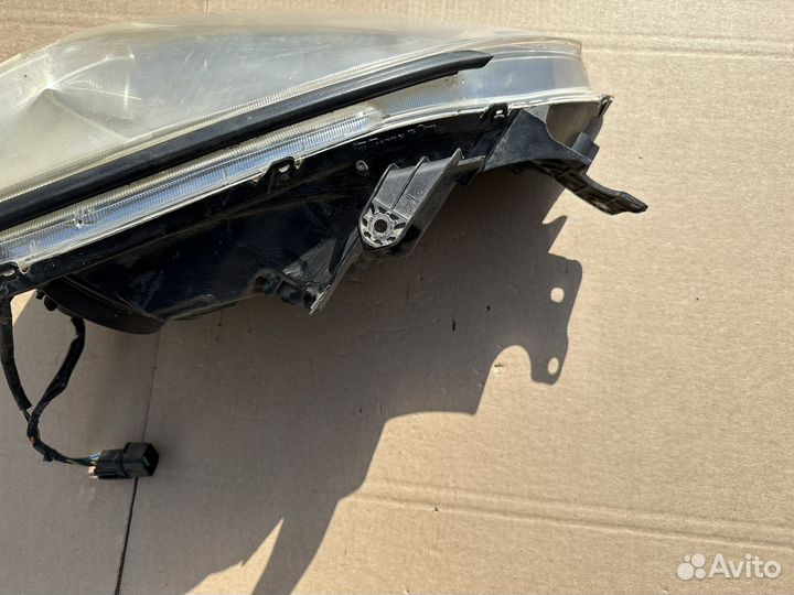 Фара левая Mitsubishi Lancer 9