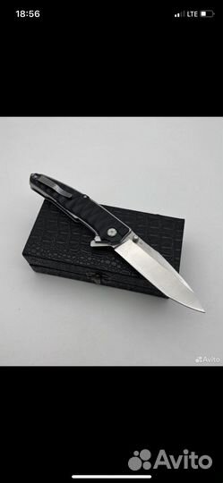 Нож складной на титановых подшипниках сталь D2