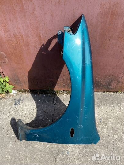 Крыло переднее левое Mazda 323P BA Арт. 260638