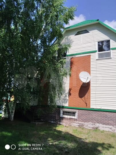 Коттедж 208 м² на участке 24 сот.