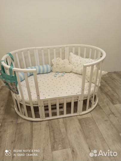 Детская кроватка с маятником круглая