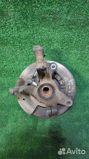 Кулак поворотный Mazda Familia,левый передний BJ8W