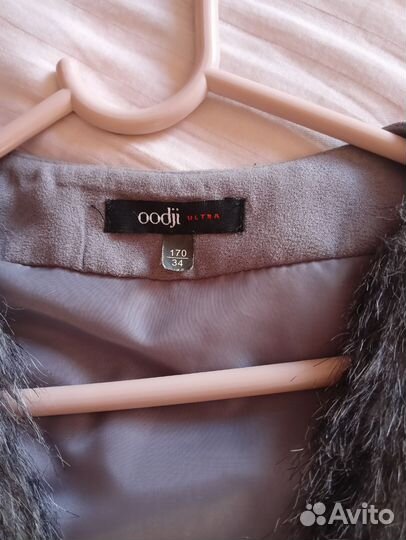 Жилетка меховая женская