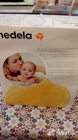 Молокоотсос medela электрический