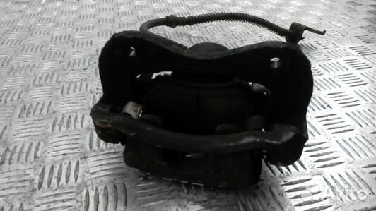 Суппорт тормозной передний левый hyundai tucson JM