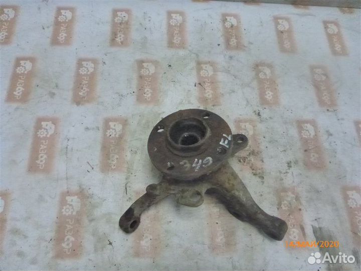 Кулак поворотный передний левый Volkswagen Passat