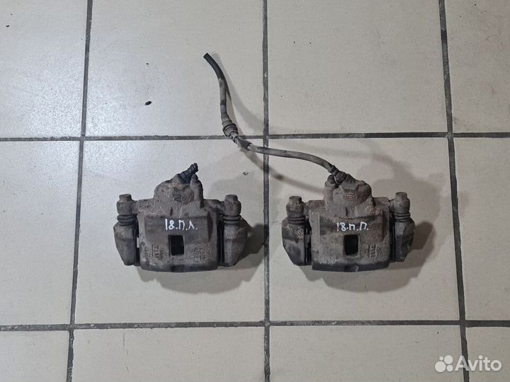 Суппорт передний Kia Spectra