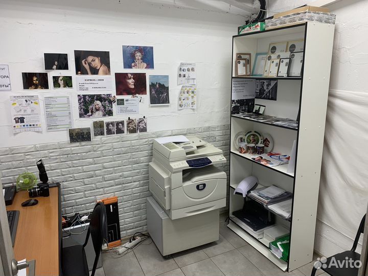 Сотрудник в фотосалон