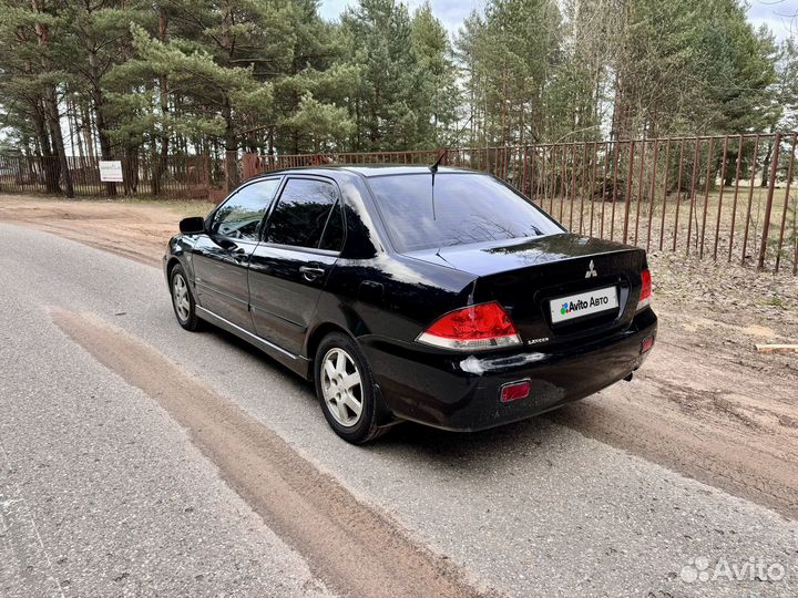 Mitsubishi Lancer 1.6 МТ, 2006, 194 000 км