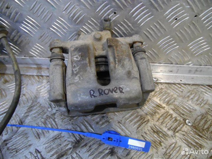 Суппорт тормозной задний правый Land Rover Range
