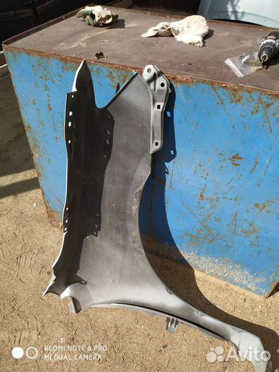 Крыло переднее левое