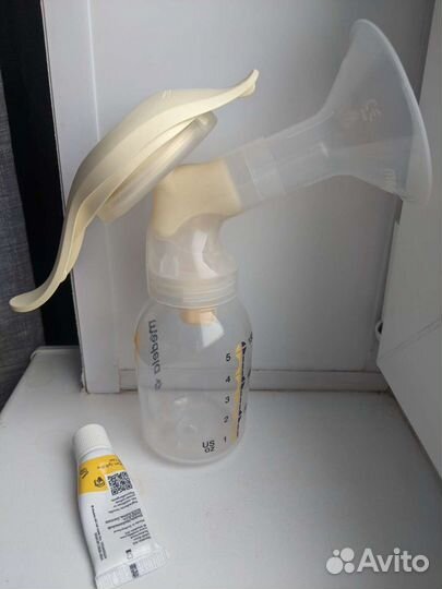 Молокоотсос medela ручной