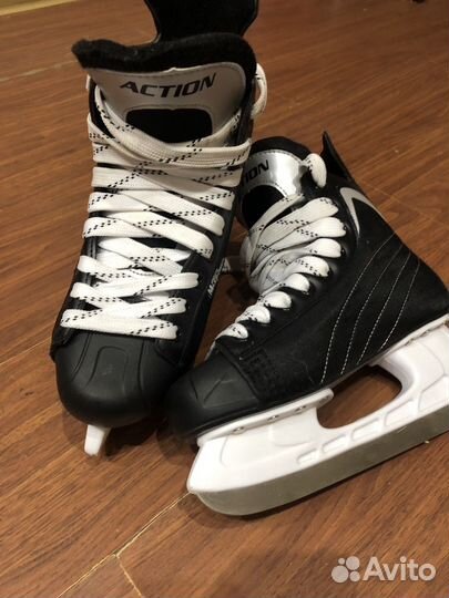 Коньки хоккейные action