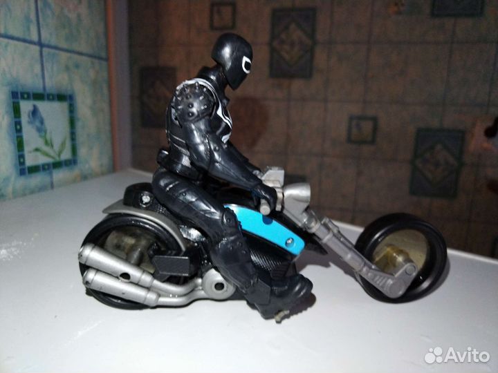 Игрушка веном с мото
