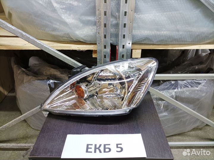 Левая фара Mitsubishi Lancer 9