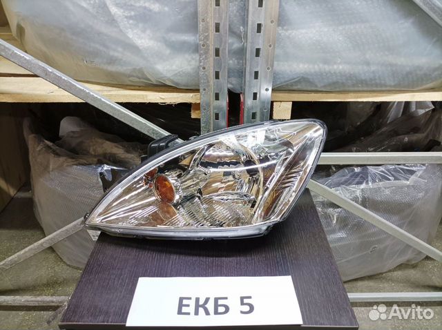 Левая фара Mitsubishi Lancer 9