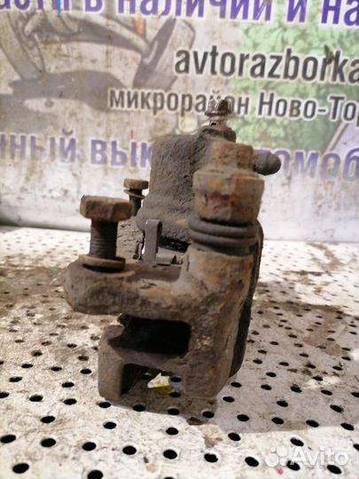 Суппорт задний правый Mazda Xedos 9