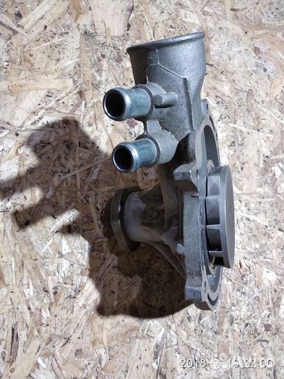 Помпа на опель омега двигатель 2.6л