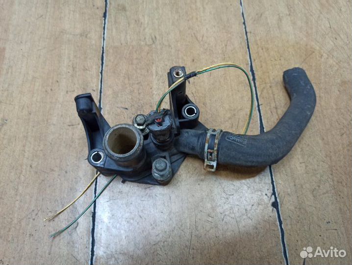 Корпус термостата Ford Fiesta snja 2009