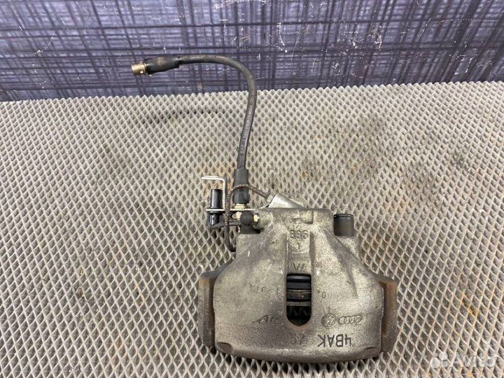 Суппорт передний левый Volkswagen Passat Variant