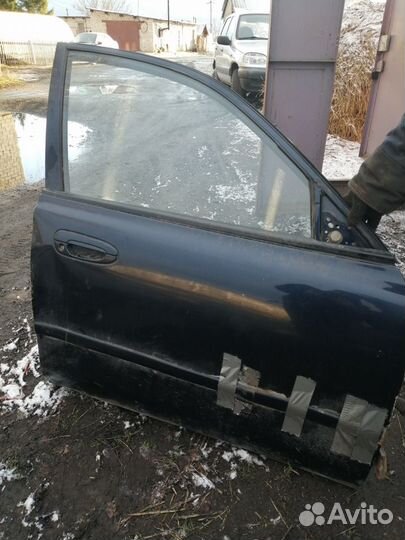 Двери мазда 626GE 1995 года