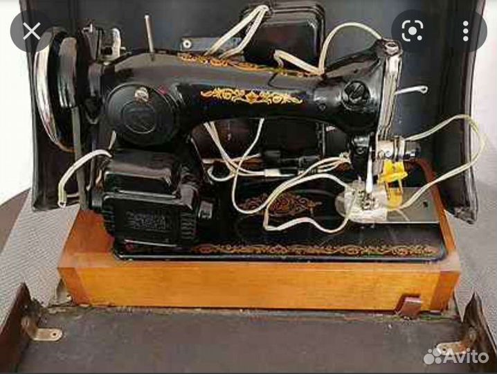 Электрическая швейная машинка