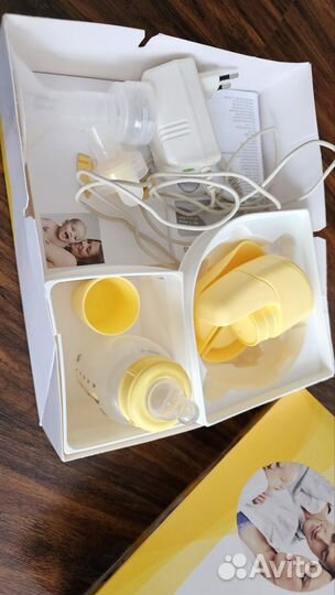 Молокоотсос medela электрический
