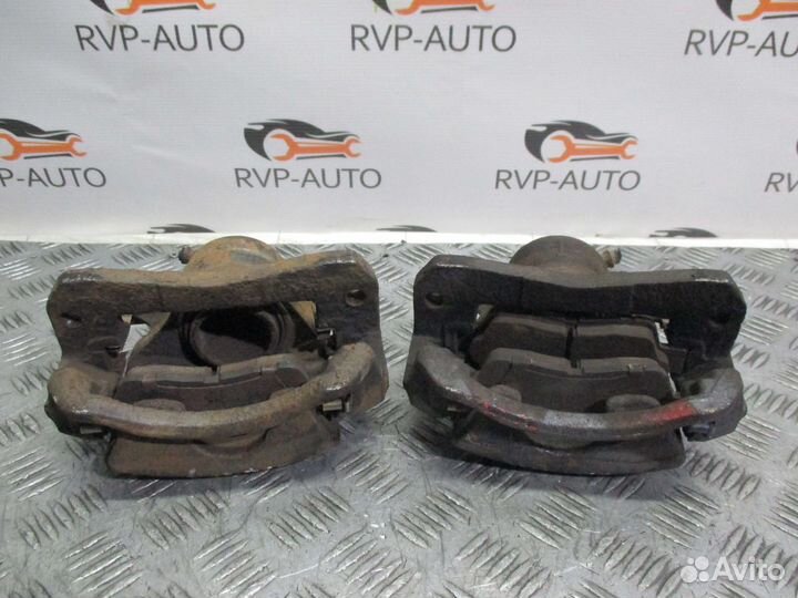 Суппорт тормозной передний Toyota Camry 1992-1996